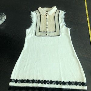 Free people off white and black blouse